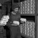 U.S. soldiers Lieutenant Colonel Ben T. Ammons (left) and Captain Virgil Happy in a bank in Magdeburg, Germany, where soldiers discovered 280 million dollars in Reichsmark notes on April 27, 1945.
